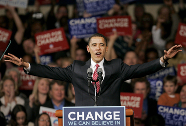 Democratic presidential hopeful, Sen. Barack Obama, D-Ill., responds to a warm welcome from the audience as he approaches the microphone during a South Carolina victory party in Columbia, S.C. Saturday, Jan. 26, 2008. (AP Photo/Steven Senne)