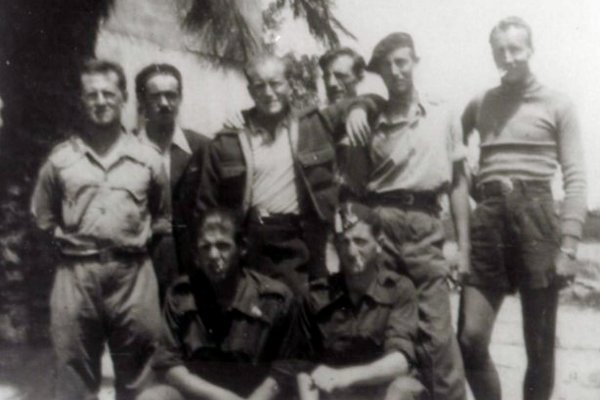 McCain's favorite Communist: Delmer Berg, standing second from right wearing a beret, with the Abraham Lincoln Brigade in Spain around 1938.