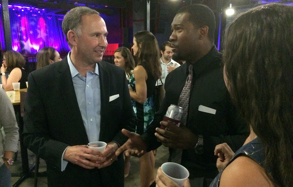 Soon-to-be-former Sen. Joel Lourie chats with well-wishers at his retirement party.