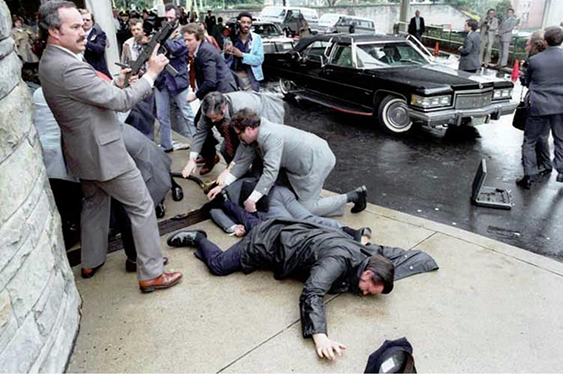 The most memorable image of the Reagan assassination attempt. In part, I recall it as the first time I ever saw an Uzi.
