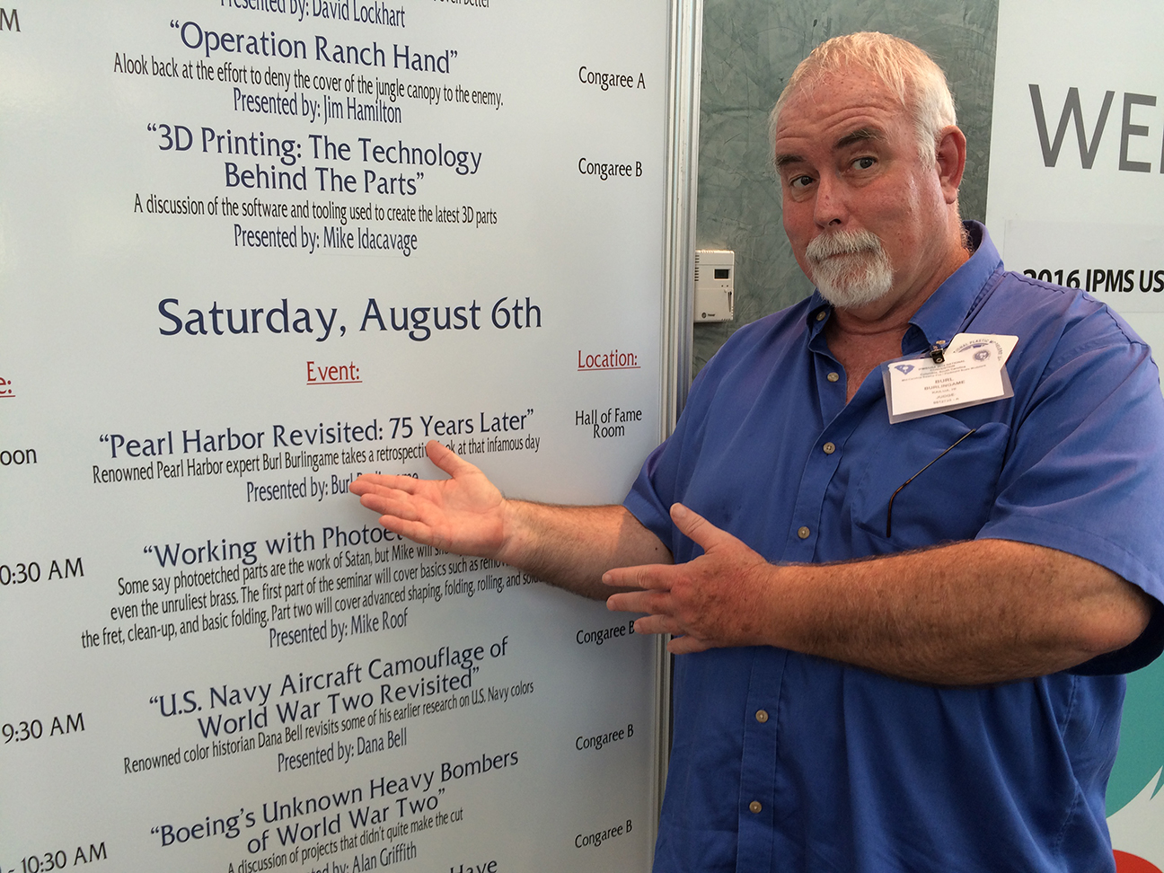 Burl is making sure we notice that the sign says he is "renowned."