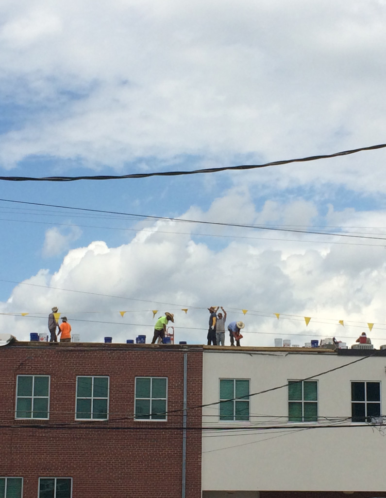 This was a disappointment. The sight of workers backed by the big, blue sky was way better IRL.