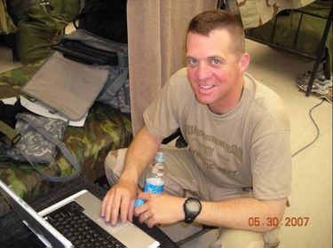 Capt. Smith writing home from Afghanistan in 2007.