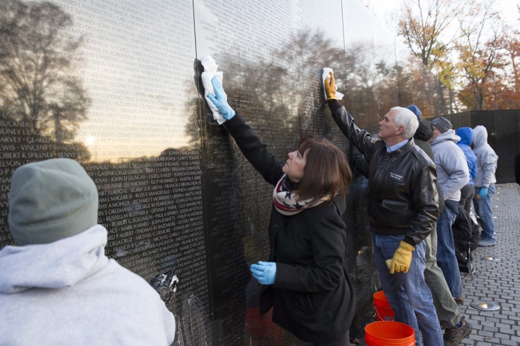 Pence was accompanied by his wife when cleaning the Vietnam Memorial over the weekend.