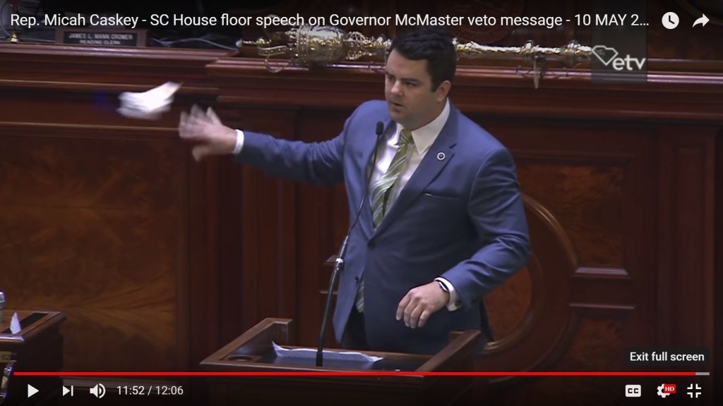 Micah Caskey last year, wadding up the governor's veto message and throwing it away.