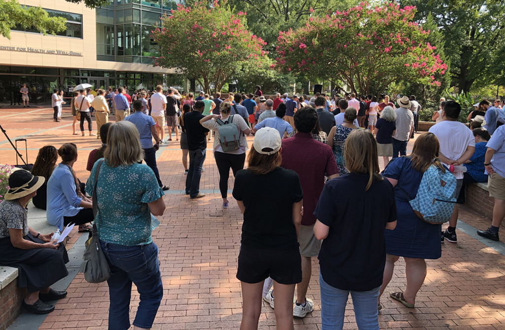 Wherever possible, folks stood in the shade....