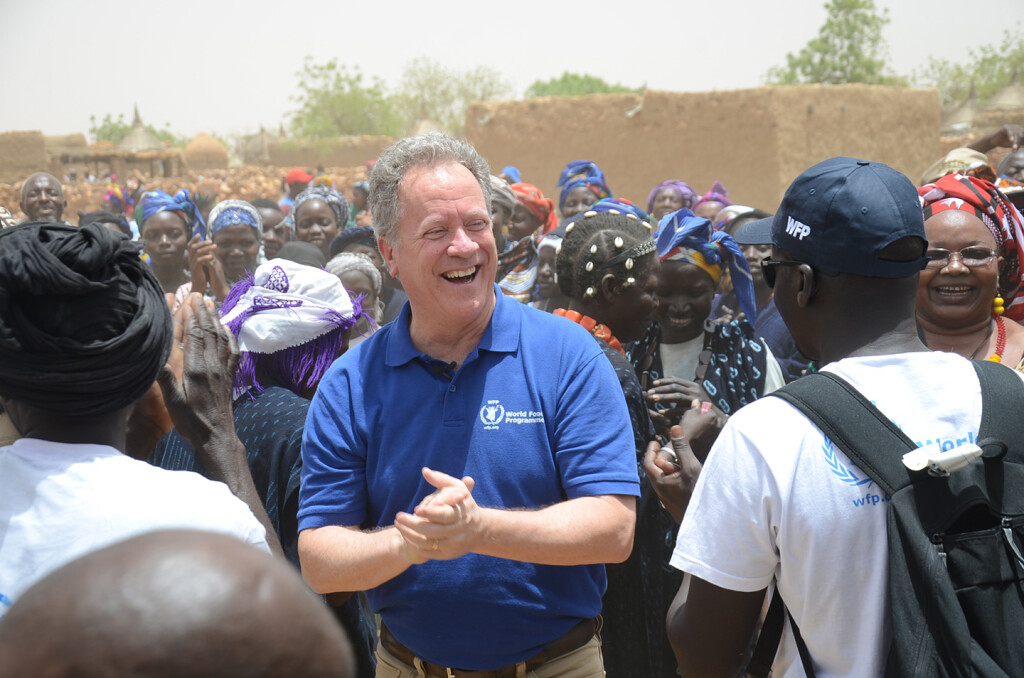 Mali,  Koundougou village, Mopti region, 20 May 2018 The Executive Director of the World Food Programme (WFP), David Beasley, travelled to West Africa, where more than five million people in six countries of the Sahel region – Burkina Faso, Chad, Mali, Mauritania, Niger and Senegal - could go hungry this year.  “In the Sahel, low rainfall has hurt harvests and reduced fodder and water for livestock, making lives harder for people there. WFP is working actively to help, and I am looking forward to meeting with the leaders of Senegal, Mali and Niger to reinforce our commitment to support their response plans. Our work in this region also includes long-term programmes that help communities help themselves, and I am looking forward to meeting men, women and children who are participating in these efforts.”      WFP urgently requires US$165 million to meet the needs of 3.5 million people during the lean season.  WFP is also working with partners and national governments on plans to scale up resilience to create jobs for young people; rehabilitate land and restore ecosystems; and invest in health, nutrition and education for a sustainable future.  In the Photo: WFP Executive Director David Beasley warmly welcomed by the community in the village of Koundougou, where WFP provides humanitarian assistance to address urgent needs during lean season, along with resilience building activities for long-term food security. Photo: WFP/Cecilia Aspe