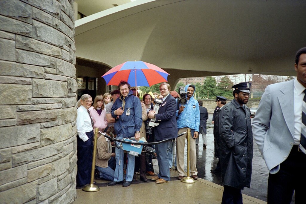 This was just before the Reagan shooting. Hinckley stands out because of his expression.
