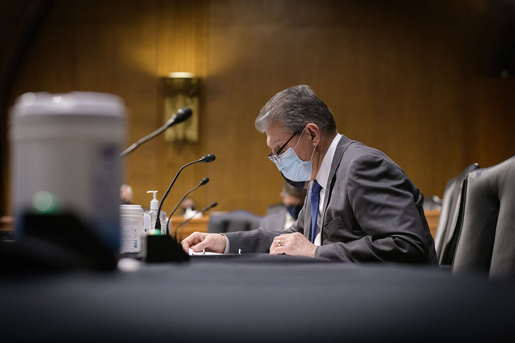 Sen. Joe Manchin, masked but certainly not muzzled these days.